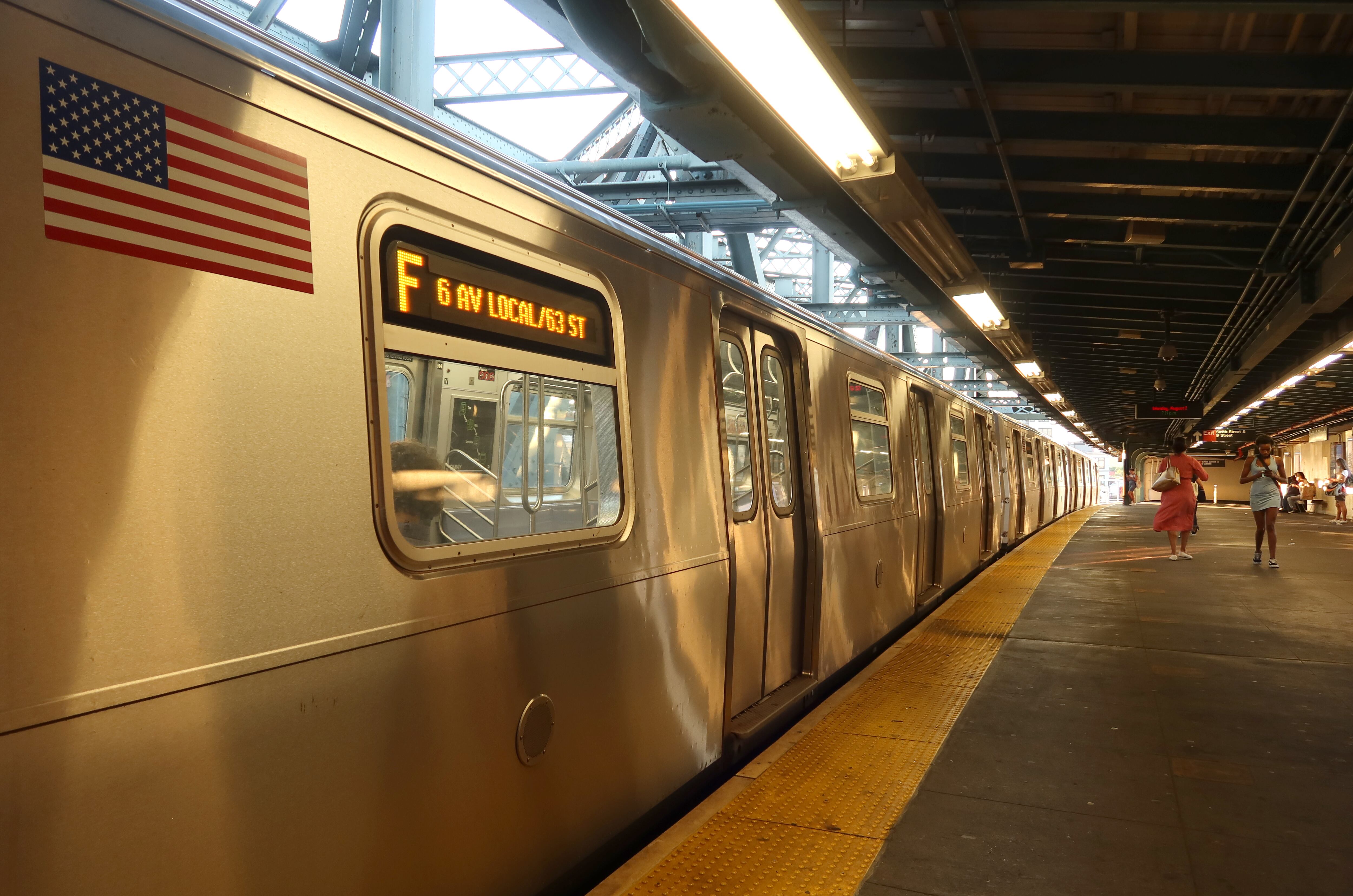 NEW YORK, NY - AUGUST 2: An F train waits to pull out of the Smith - 9th Street station in Brooklyn on August 2, 2021 in New York City.  (Photo by Gary Hershorn/Getty Images)