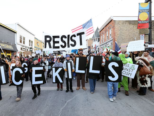 PARK CITY, UTAH - JANUARY 26: Demonstrators protest the United States Immigration and Customs Enforcement (ICE) on Main Street during the 2026 Sundance Film Festival on January 26, 2026 in Park City, Utah. Protests and demonstrations have broken out in multiple cities following the fatal shootings of Renee Good and Alex Pretti by federal agents in Minneapolis. (Photo by Jesse Grant/Getty Images)