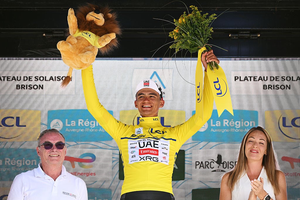 BRISON, FRANCE - JUNE 14: Isaac Del Toro of Mexico and UAE Team Emirates - XRG celebrates at podium as Yellow Leader Jersey winner with the presence of the five times Tour de France winner, Bernard Hinault of France (L) during the 78th Tour Auvergne-Rhone-Alpes 2026, Stage 8 a 120.1km stage from Beaufort to Plateau de Solaison - Brison 1497m / #UCIWT / on June 14, 2026 in Brison, France. (Photo by Dario Belingheri/Getty Images)