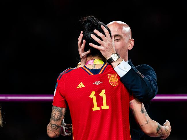 SYDNEY, AUSTRALIA - AUGUST 20: President of the Royal Spanish Football Federation Luis Rubiales (R) kisses Jennifer Hermoso of Spain (L) during the medal ceremony of FIFA Women's World Cup Australia & New Zealand 2023 Final match between Spain and England at Stadium Australia on August 20, 2023 in Sydney, Australia. (Photo by Noemi Llamas/Eurasia Sport Images/Getty Images)
