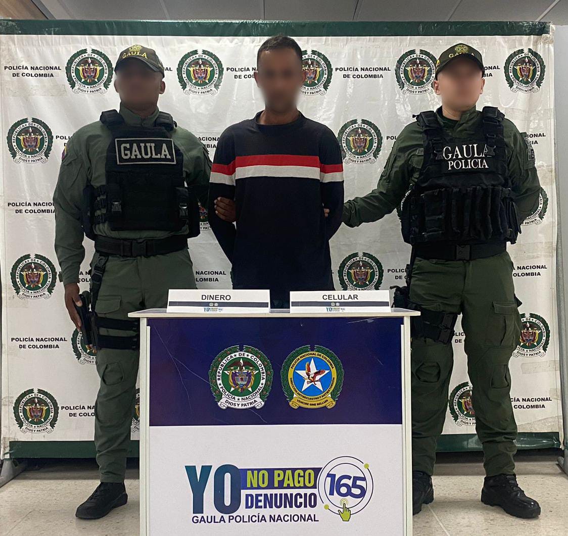 Extranjero capturado cuando recibía dinero producto de la extorsión a un comerciante