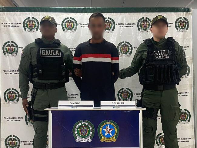 Extranjero capturado cuando recibía dinero producto de la extorsión a un comerciante