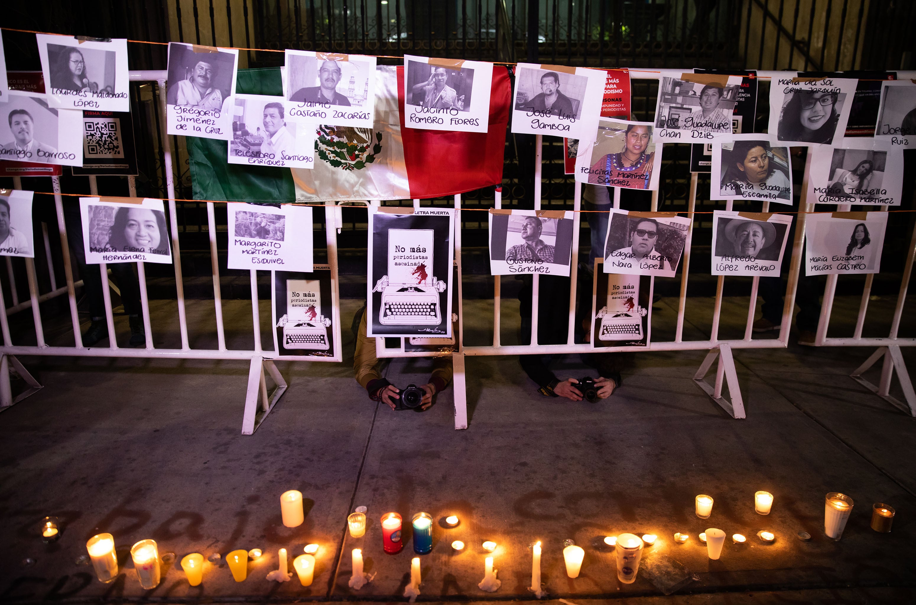 MEXICO CITY, MEXICO -  JANUARY 25: Photos of murdered journalists were placed during a protest to demand justice, in front of the Interior Ministry Office, in Mexico City, Mexico on January 25, 2022. Journalist Lourdes Maldonado Lopez was found shot to death in her car outside her home in the northern city of Tijuana, marking the third killing of a journalist in the country just this year. (Photo by Daniel Cardenas/Anadolu Agency via Getty Images)