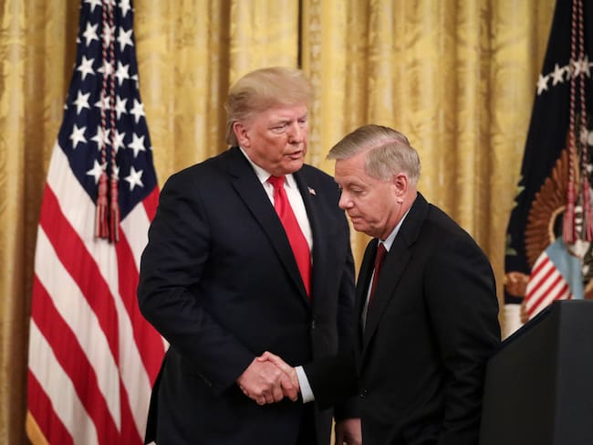 Donald Trump y Lindsey Graham. (Photo by Drew Angerer/Getty Images)