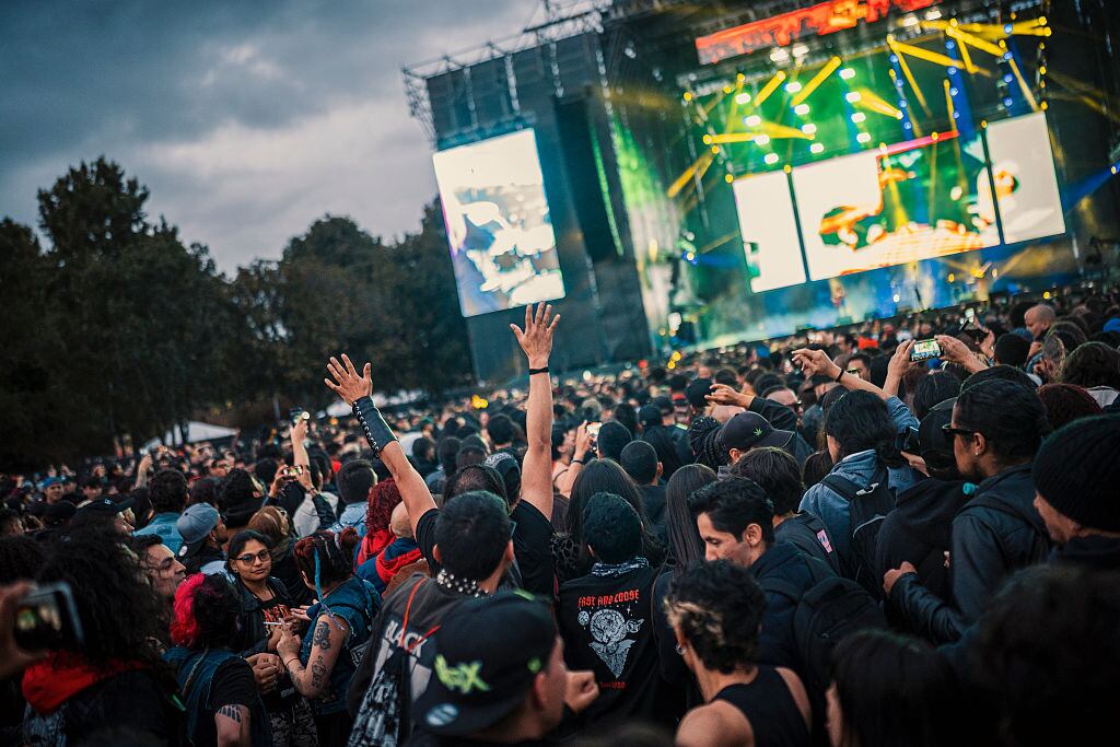 BOGOTA, COLOMBIA - JUNE 21: A fan raise his hands during Rock Al Parque Festival on June 21, 2025 in Bogotá, Colombia. (Photo by Diego Cuevas/Getty Images)