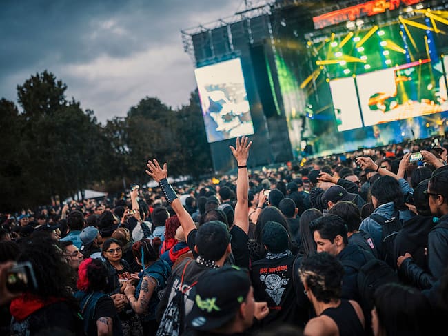 BOGOTA, COLOMBIA - JUNE 21: A fan raise his hands during Rock Al Parque Festival on June 21, 2025 in Bogotá, Colombia. (Photo by Diego Cuevas/Getty Images)