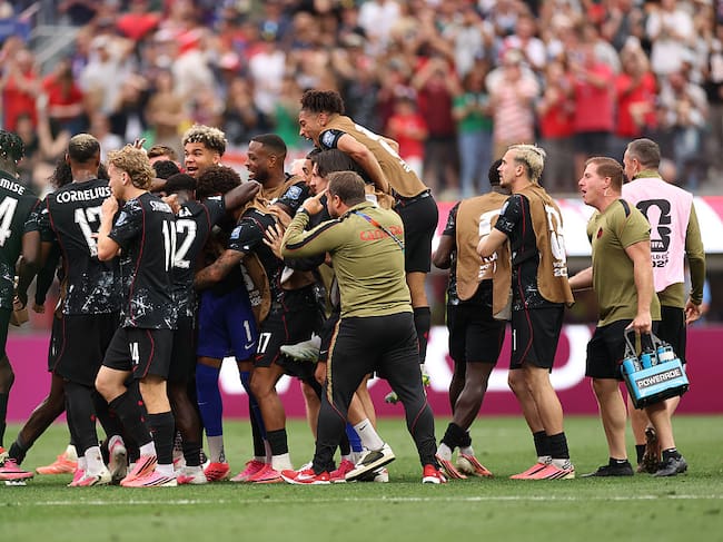 INGLEWOOD, CALIFORNIA - JUNE 28: Stephen Eustaquio #7 of Canada (obscured) celebrates scoring his team's first goal with team mates during the FIFA World Cup 2026 Round Of 32 match between South Africa and Canada at Los Angeles Stadium on June 28, 2026 in Inglewood, California. (Photo by Sarah Stier - FIFA/FIFA via Getty Images)