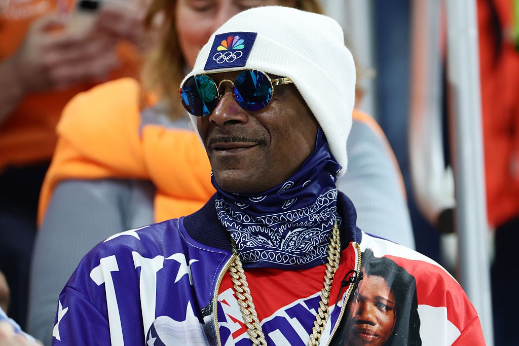 MILAN, ITALY - FEBRUARY 15: Snoop Dogg, Rapper and Honorary Coach of Team USA attends the Speed Skating Women's 500m on day nine of the Milano Cortina 2026 Winter Olympic games at Milano Speed Skating Stadium on February 15, 2026 in Milan, Italy. (Photo by Andreas Rentz/Getty Images)
