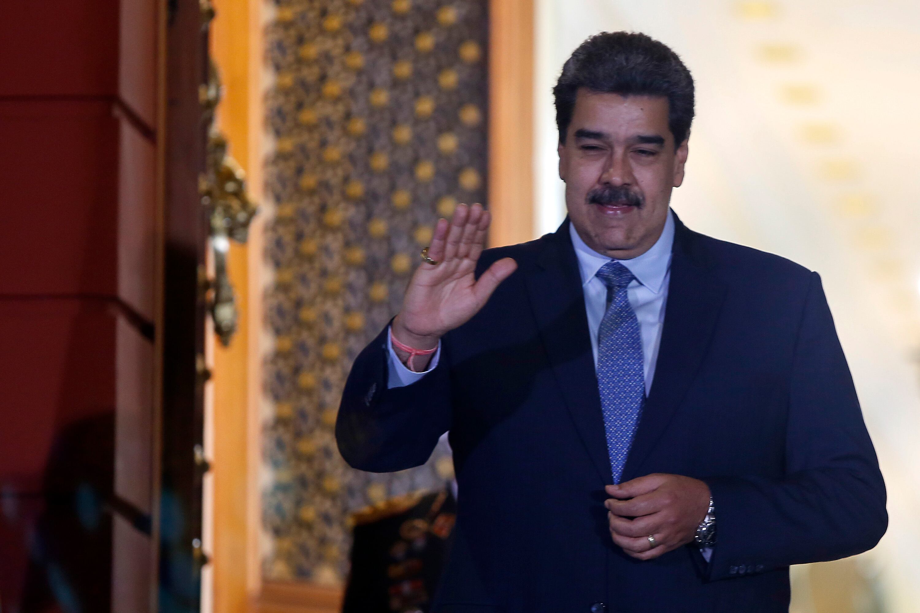 CARACAS, VENEZUELA - OCTOBER 04:  President of Venezuela Nicolas Maduro gestures after a meeting with Colombian Chancellor Alvaro Leyva after reestablishing diplomatic relationships at Miraflores Palace on October 04, 2022 in Caracas, Venezuela. With Venezuela, Cuba and Norway acting as guarantors, the Colombian government and the Colombian guerrilla National Liberation Army announced thy will resume peace talks. Maduro accepted to be a mediator after the request of president Petro, considered as a move to strengthen relations between Colombia and Venezuela. (Photo by Pedro Ramses Mattey/Getty Images)