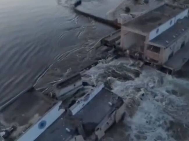 KHERSON, UKRAINE - JUNE 6: (----EDITORIAL USE ONLY - MANDATORY CREDIT - " ZELENSKYY SOCIAL MEDIA ACCOUNT / HANDOUT" - NO MARKETING NO ADVERTISING CAMPAIGNS - DISTRIBUTED AS A SERVICE TO CLIENTS----) A screen grab captured from a video shows the Kakhovka Hydroelectric Power Plant after a blast occurred in plant which is in the Russian-controlled part of Ukraine's Kherson on June 6, 2023. The explosion unleashed floodwaters across the war zone. (Photo by Zelenskyy Social Media Account / Handout/Anadolu Agency via Getty Images)