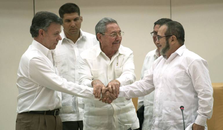 Presidente Juan Manuel Santos y máximo líder de las Farc, Timoleón Jiménez alias "Timochenko"