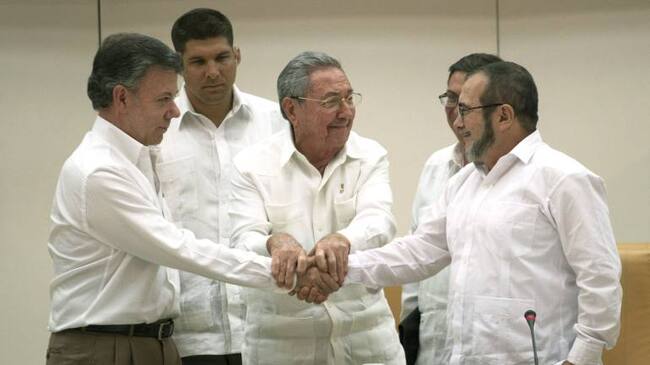 Presidente Juan Manuel Santos y máximo líder de las Farc, Timoleón Jiménez alias "Timochenko"