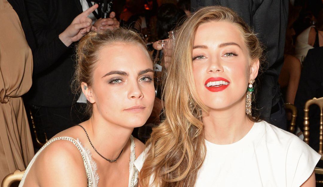 Cara Delevingne y Amber Heard. 
