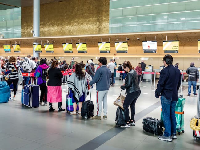 Bogota, Colombia, El Dorado International Airport, Aeroporto Internacional El Dorado, terminal inside with very long Spirit airline check in line. (Photo by: Jeffrey Greenberg/Universal Images Group via Getty Images)