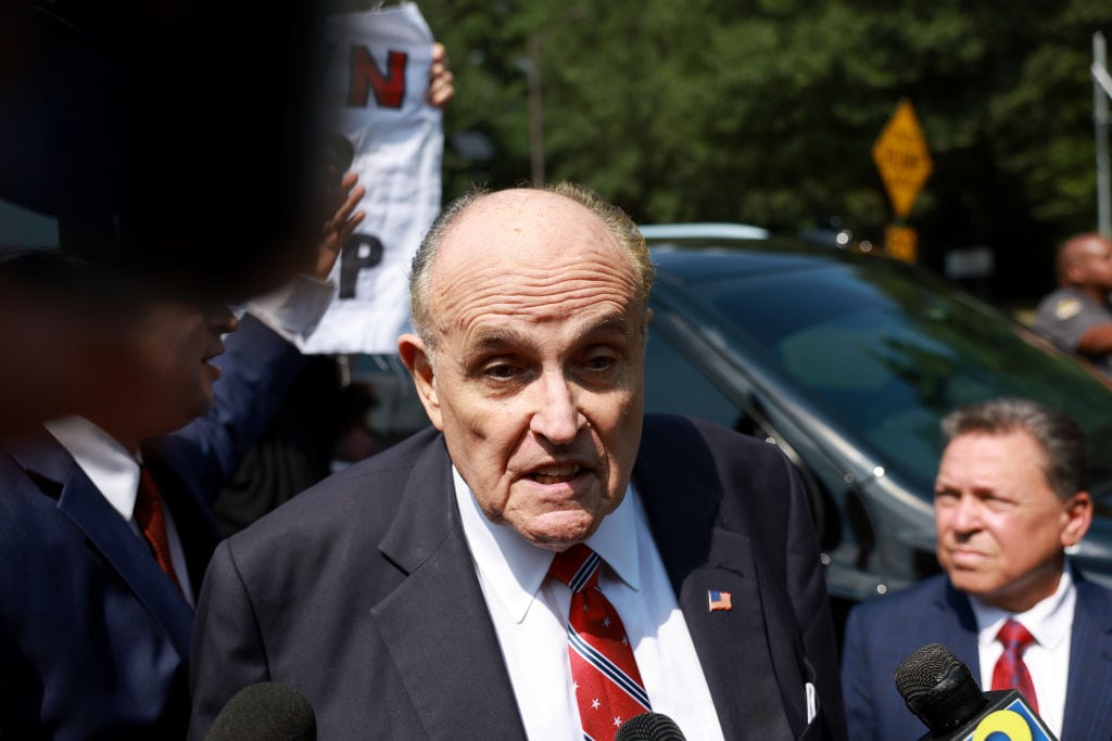 ATLANTA, GEORGIA - AUGUST 23: Rudy Giuliani speaks to the media after leaving the Fulton County jail on August 23, 2023 in Atlanta, Georgia. Giuliani is one of 19, including former President Donald Trump, facing felony charges in the indictment related to tampering with the 2020 election in Georgia who have been ordered to turn themselves in by August 25. (Photo by Joe Raedle/Getty Images)