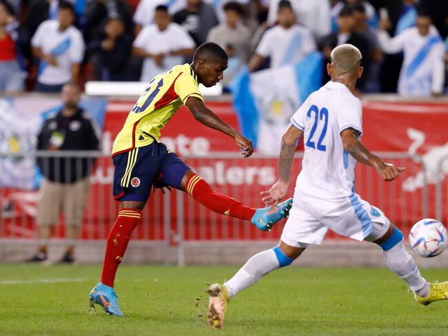 Colombia&#039;s Yaser Asprilla (L) shoots to score a goal during the international friendly football match between Colombia and Guatemala at Red Bull Arena in Harrison, New Jersey, on September 24, 2022. (Photo by Andres Kudacki / AFP) (Photo by ANDRES KUDACKI/AFP via Getty Images)