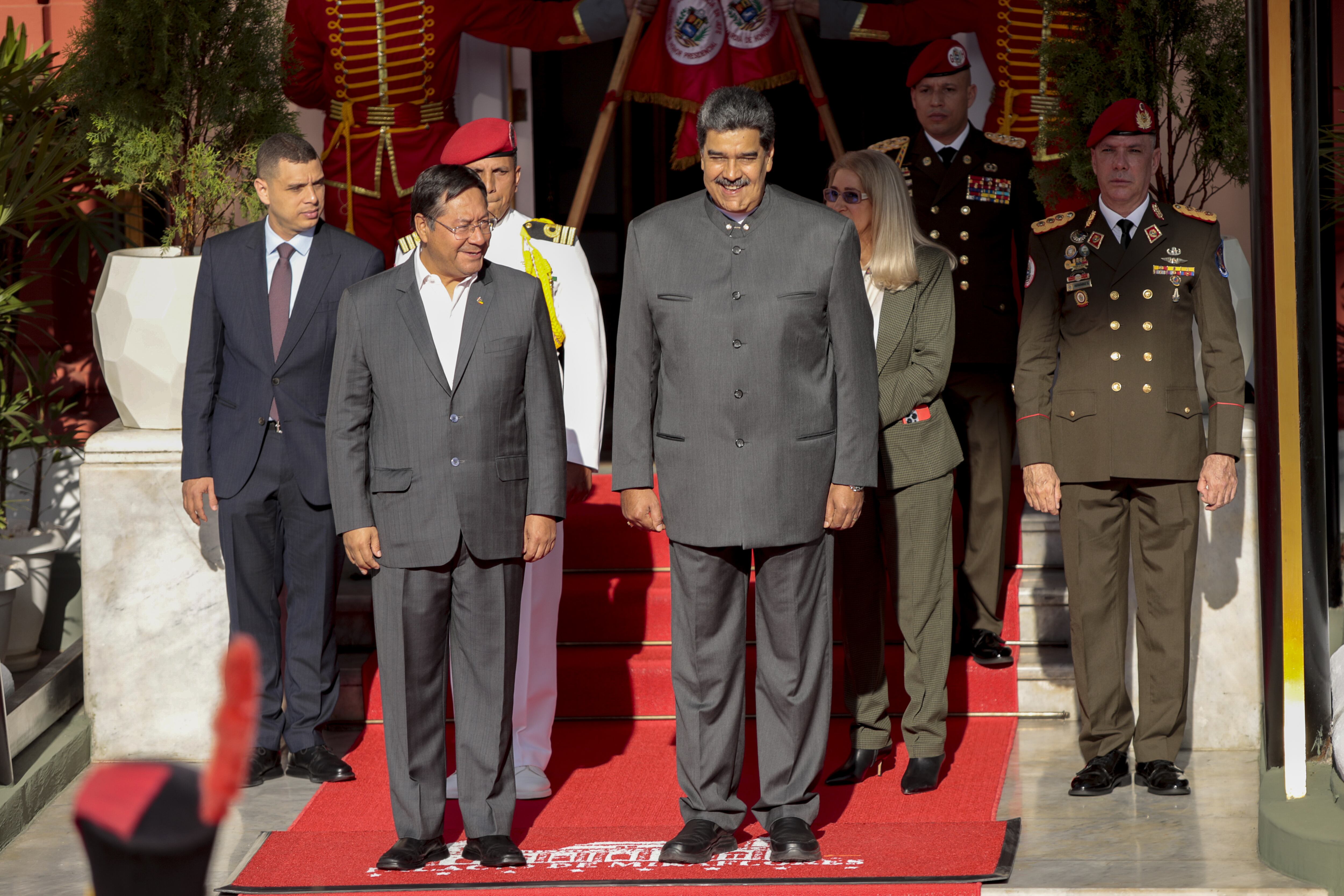 CARACAS, VENEZUELA - APRIL 20: Venezuelan President Nicolas Maduro (R) welcomes Bolivian President Luis Arce (L) with an official ceremony prior to a meeting at the Miraflores Palace in Caracas, Venezuela on April 20, 2023. (Photo by Pedro Rances Mattey/Anadolu Agency via Getty Images)