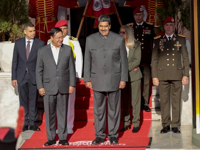 CARACAS, VENEZUELA - APRIL 20: Venezuelan President Nicolas Maduro (R) welcomes Bolivian President Luis Arce (L) with an official ceremony prior to a meeting at the Miraflores Palace in Caracas, Venezuela on April 20, 2023. (Photo by Pedro Rances Mattey/Anadolu Agency via Getty Images)