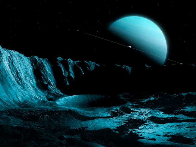 Ilustración del planeta Urano, visto desde la superficie de su luna sustancial más interna, Ariel / Getty Images