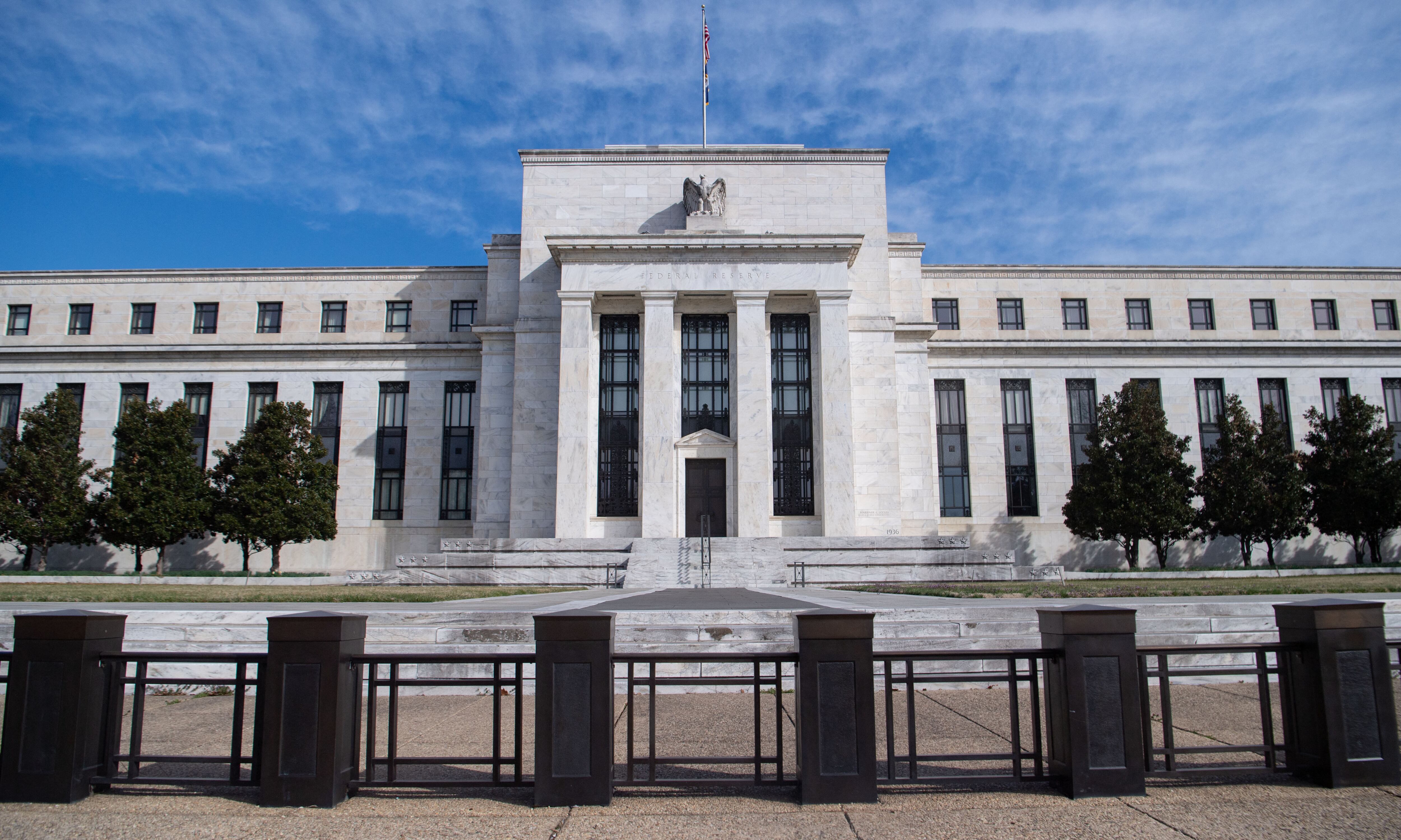The Marriner S. Eccles Federal Reserve Board building is seen in Washington, DC, March 16, 2022. - The Federal Reserve is expected to announce the first interest rate increase since the Covid-19 pandemic began at the conclusion of its policy setting meeting later today. (Photo by SAUL LOEB / AFP) (Photo by SAUL LOEB/AFP via Getty Images)