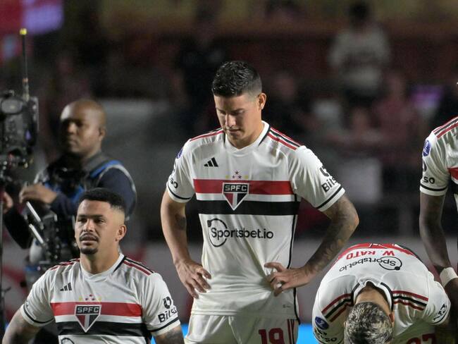 Sao Paulo's forward Luciano (L), Colombian midfielder James Rodriguez (C), and midfielder Wellington Rato react after losing against Liga de Quito in the penalty shoot-out of the Copa Sudamericana quarterfinals second leg football match between Brazil's Sao Paulo and Ecuador's Liga de Quito at the Morumbi stadiumn, in Sao Paulo, Brazil, on August 31, 2023. (Photo by NELSON ALMEIDA / AFP) (Photo by NELSON ALMEIDA/AFP via Getty Images)