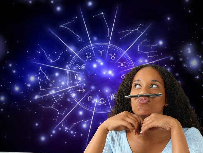 Imagen de referencia // mujer distraída // signos del zodiaco