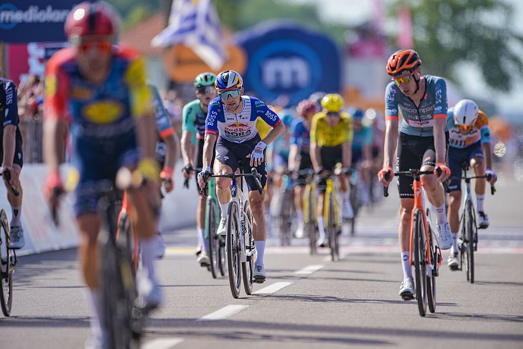 The chasing group crosses the finish line during stage 12, Imperia-Novi Ligure, of the 2026 Giro d'Italia in Novi Ligure, Italy, on May 21, 2026. (Photo by Andrea Amato/NurPhoto via Getty Images)