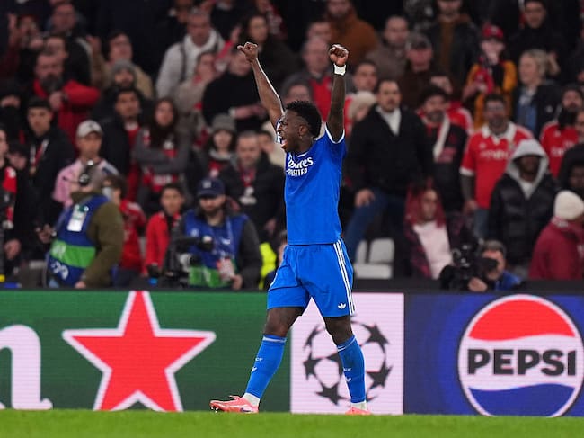 LISBON, PORTUGAL - FEBRUARY 17: Vinicius Junior of Real Madrid celebrates after the team's victory during the UEFA Champions League 2025/26 League Knockout Play-off First Leg match between SL Benfica and Real Madrid C.F. at Estadio do SL Benfica on February 17, 2026 in Lisbon, Portugal. (Photo by Angel Martinez/Getty Images)