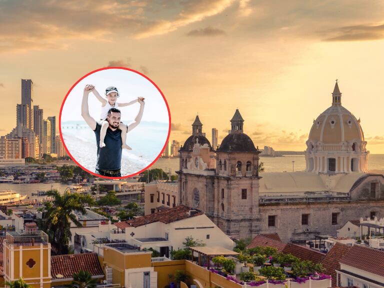 Padre disfrutando en la playa con su hija y de fondo una vista panorámica de la ciudad de Cartagena (Fotos vía Getty Images)