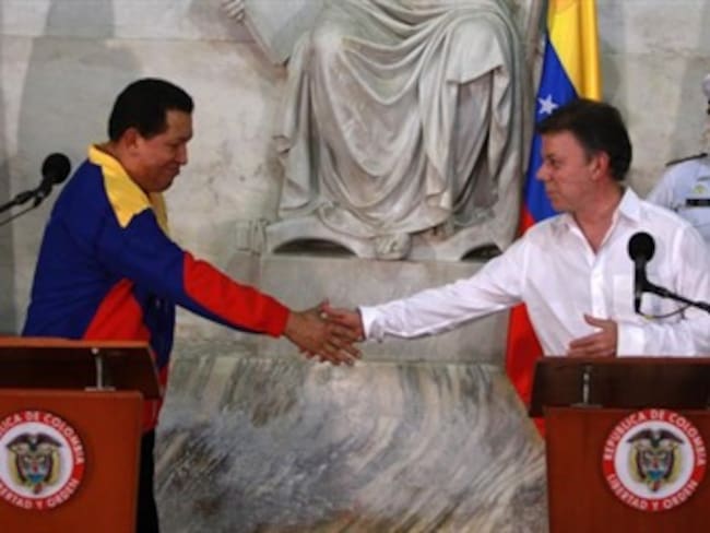 Realmente lo necesitamos en el proceso de paz: Santos a Chávez