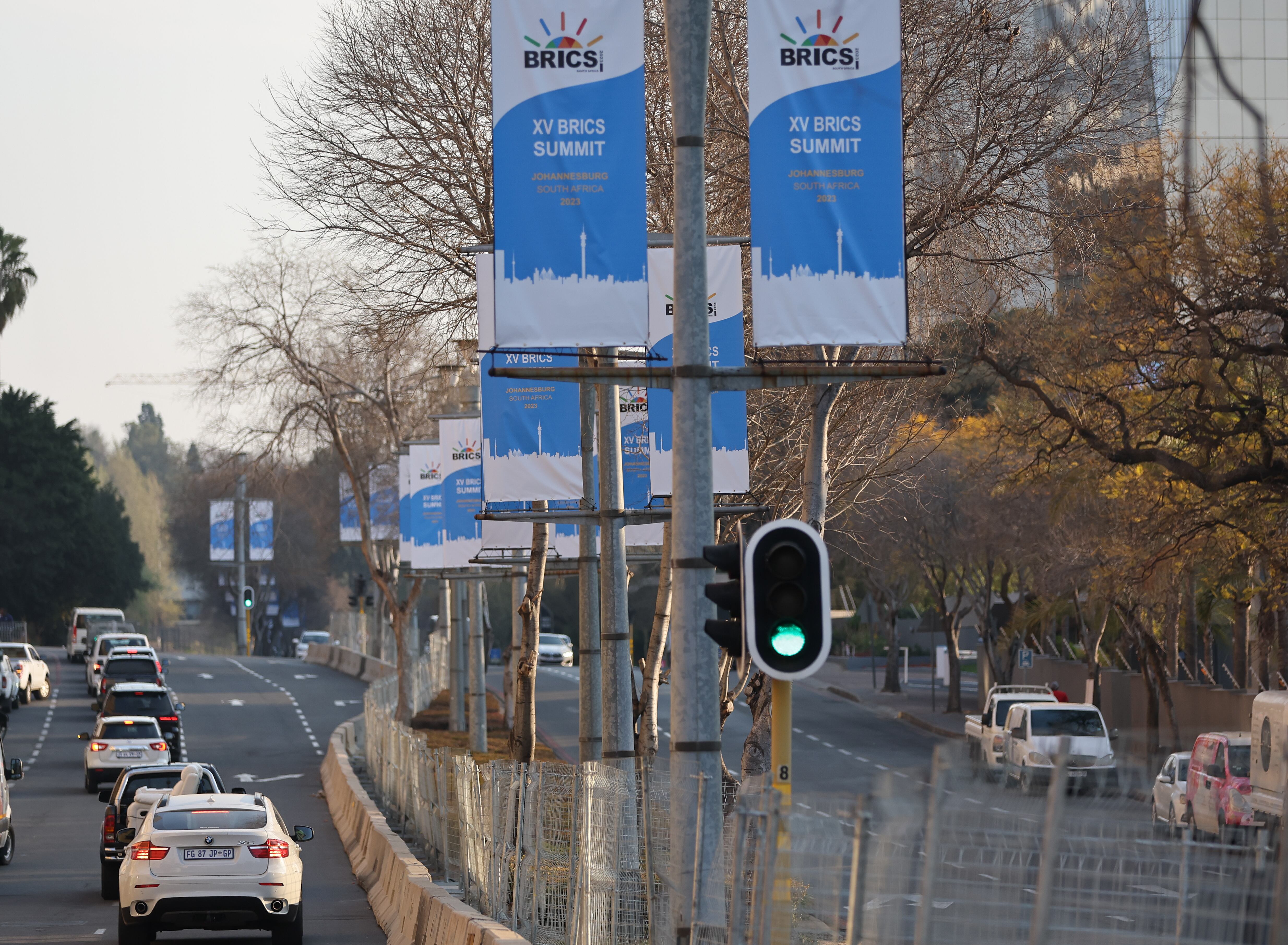 JOHANNESBURG, SOUTH AFRICA - AUGUST 20: Banners advertising the 2023 BRICS summit hang from poles on the streets on August 20, 2023 in Johannesburg, South Africa. The three-day summit is set to run August 22-24. (Photo by Sheng Jiapeng/China News Service/VCG via Getty Images)