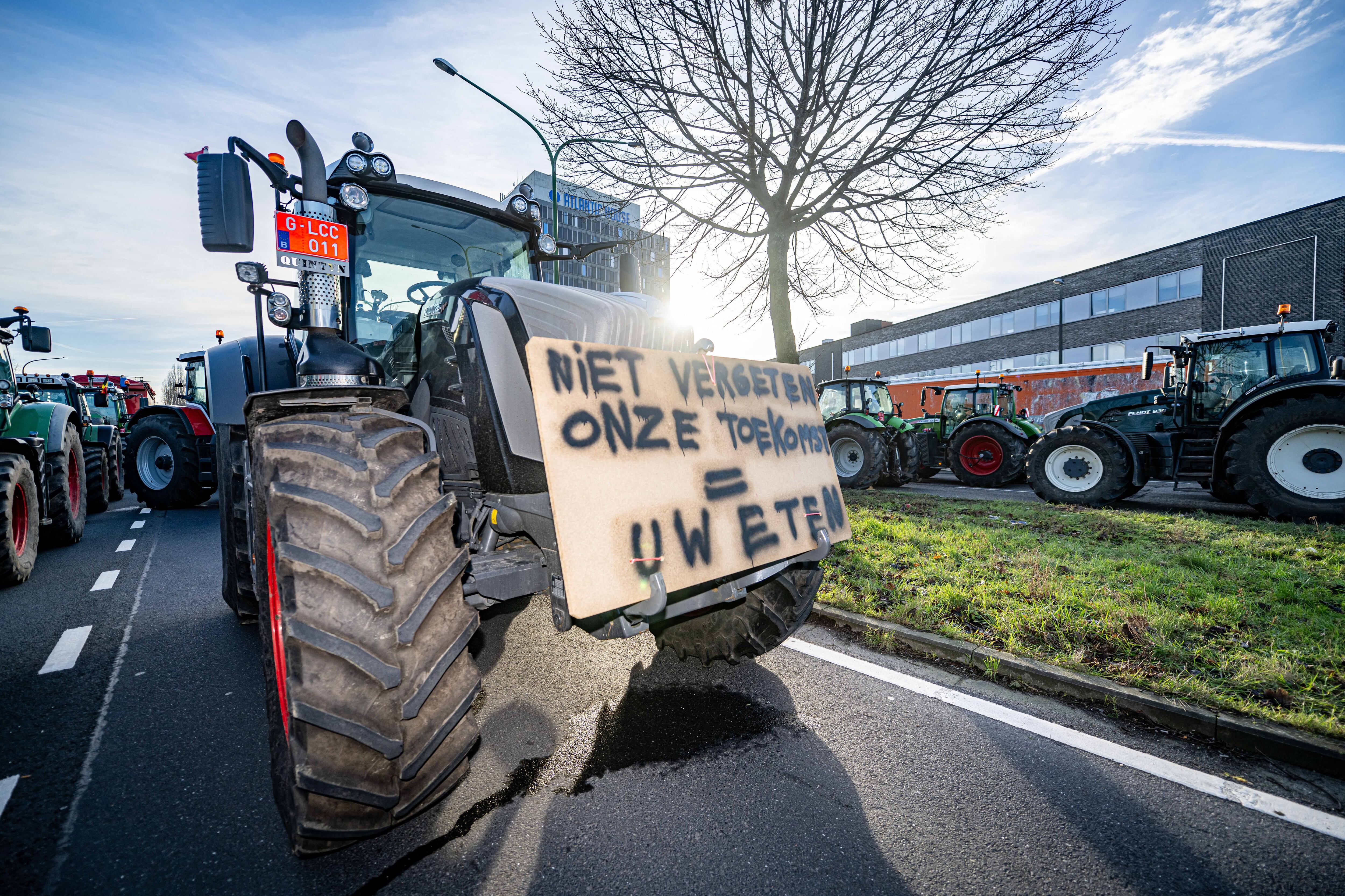 Farmers take their tractors to the streets for a protest action at the Noorderlaan near the port of Antwerp, organized by several agriculture unions, Tuesday 13 February 2024 in Antwerp. Farmers' protest across Europe as they demand better conditions to grow, produce and maintain a proper income. BELGA PHOTO JONAS ROOSENS (Photo by JONAS ROOSENS / BELGA MAG / Belga via AFP) (Photo by JONAS ROOSENS/BELGA MAG/AFP via Getty Images)