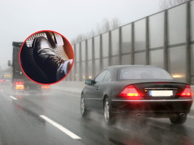 Persona frenando un carro en una vía mientras llueve (Fotos vía Getty Images)