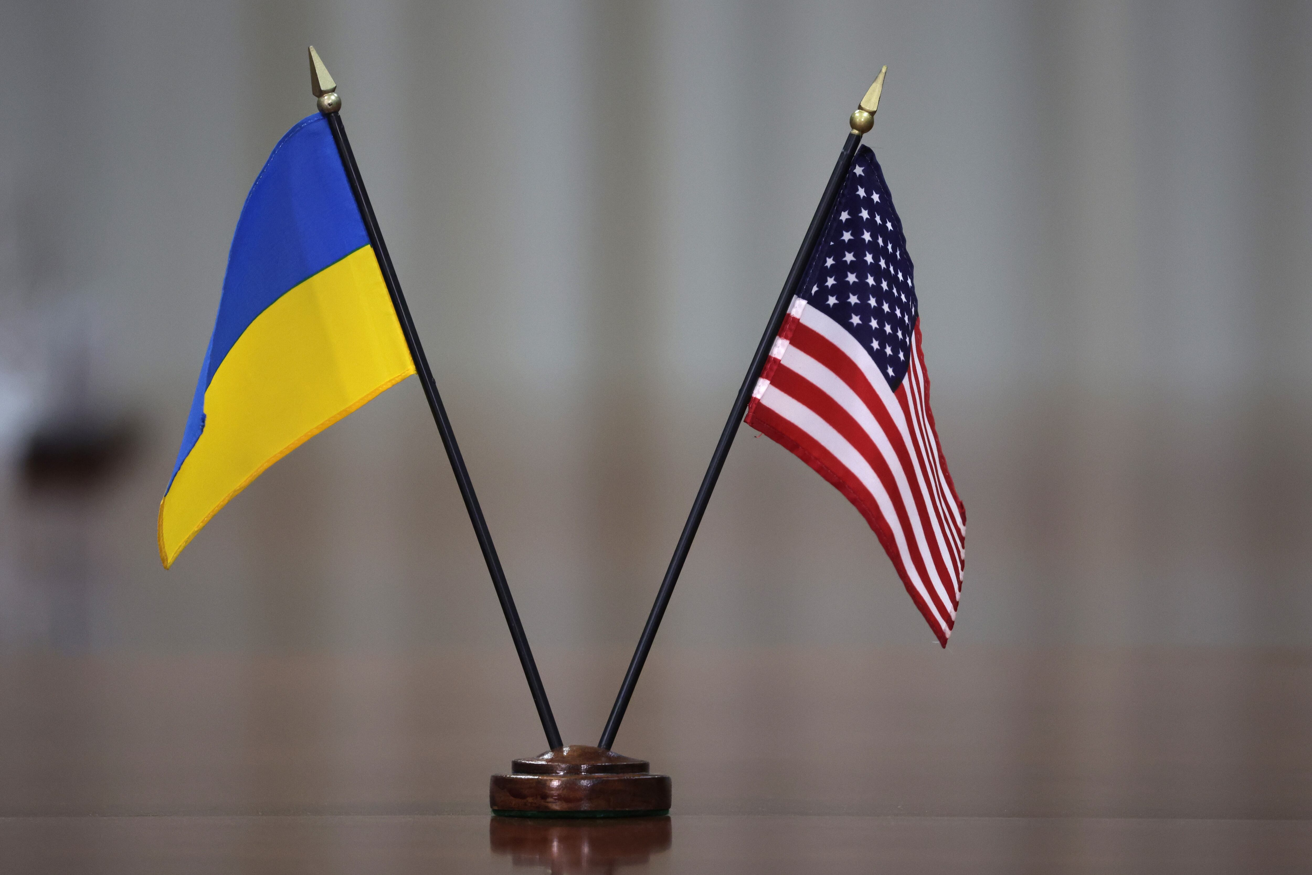 ARLINGTON, VIRGINIA - FEBRUARY 22: A flag of the United States is placed with a flag of Ukraine on the conference table during a bilateral meeting between U.S. Secretary of Defense Lloyd Austin and Foreign Minister Dmytro Kuleba of Ukraine at the Pentagon on February 22, 2022 in Arlington, Virginia. Foreign Minister Kuleba is in Washington for talks with U.S. officials, including Secretary Austin and Secretary of State Antony Blinken, to discuss Russia’s possible invasion of Ukraine. (Photo by Alex Wong/Getty Images)