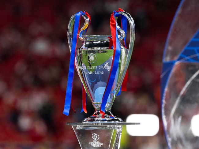 BUDAPEST, HUNGARY - MAY 30: The UEFA Champions League Trophy is displayed with red and blue ribbons for Paris Saint-Germain following the UEFA Champions League Final 2026 match between Paris Saint-Germain and Arsenal FC at Puskas Arena on May 30, 2026 in Budapest, Hungary. (Photo by Will Palmer/Sports Press Photo/Getty Images)
