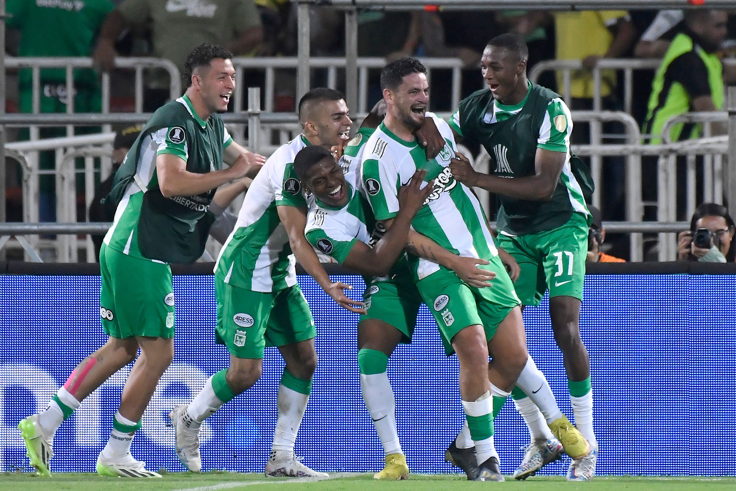 MEDELLIN, COLOMBIA - AUGUST 03: Maximiliano Cantera (C) of Atletico Nacional celebrates with teammates after scoring the team's fourth goal during a Copa CONMEBOL Libertadores 2023 round of sixteen first leg match between Atletico Nacional and Racing Club at Estadio Atanasio Girardot on August 03, 2023 in Medellin, Colombia. (Photo by Gabriel Aponte/Getty Images)
