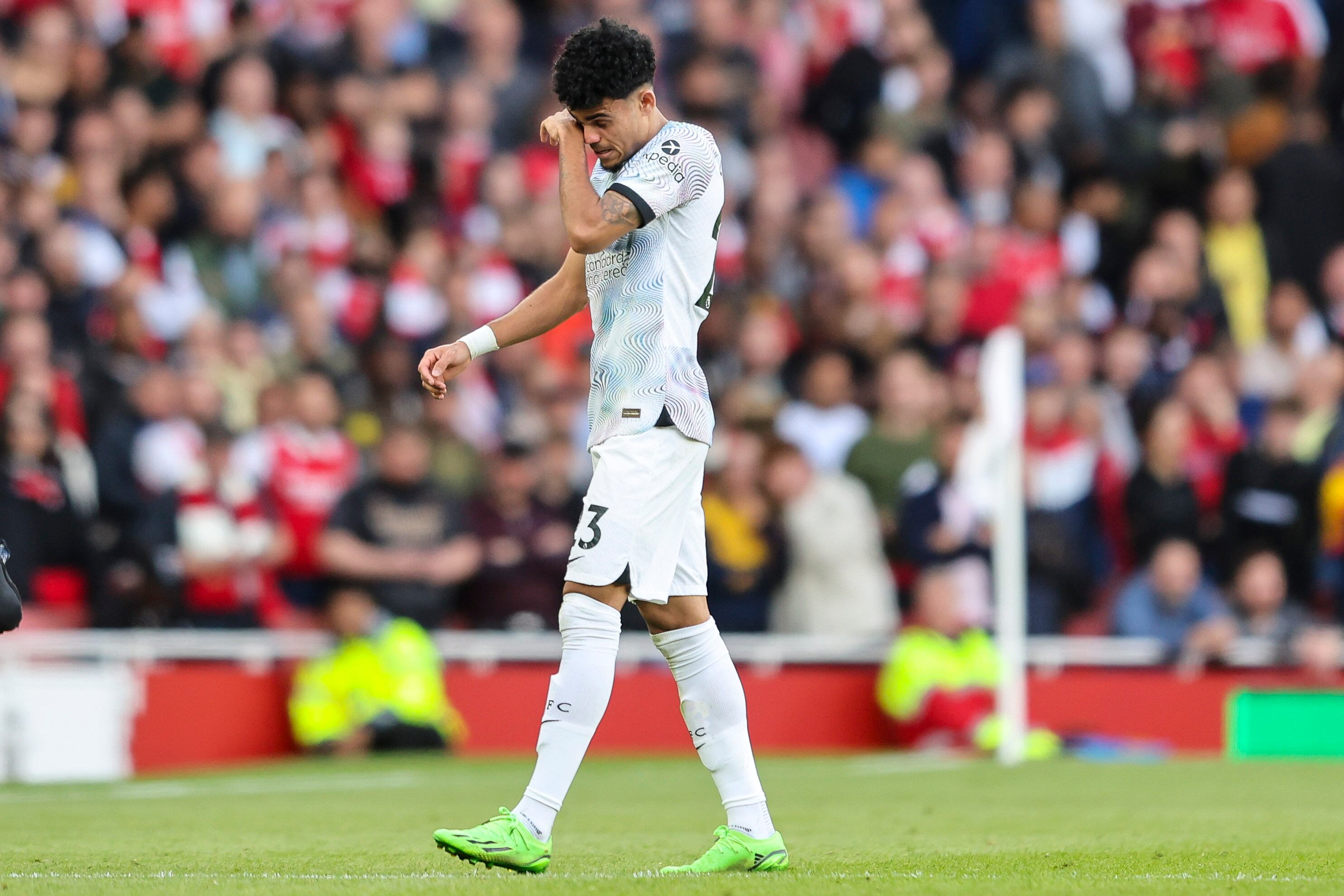 LONDON, ENGLAND - OCTOBER 09: Luis Diaz of Liverpool goes off injured during the Premier League match between Arsenal FC and Liverpool FC at Emirates Stadium on October 09, 2022 in London, England. (Photo by Robin Jones/Getty Images)