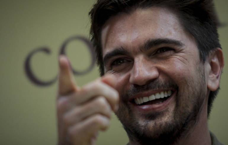 Juan Esteban Aristizabal, (Juanes.)