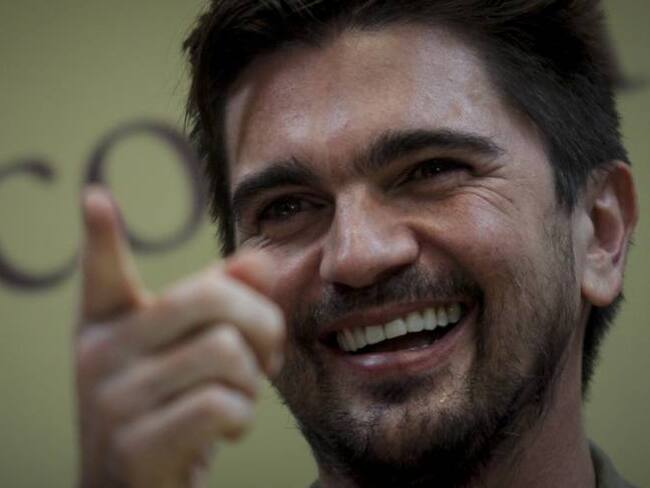 Juan Esteban Aristizabal, (Juanes.)