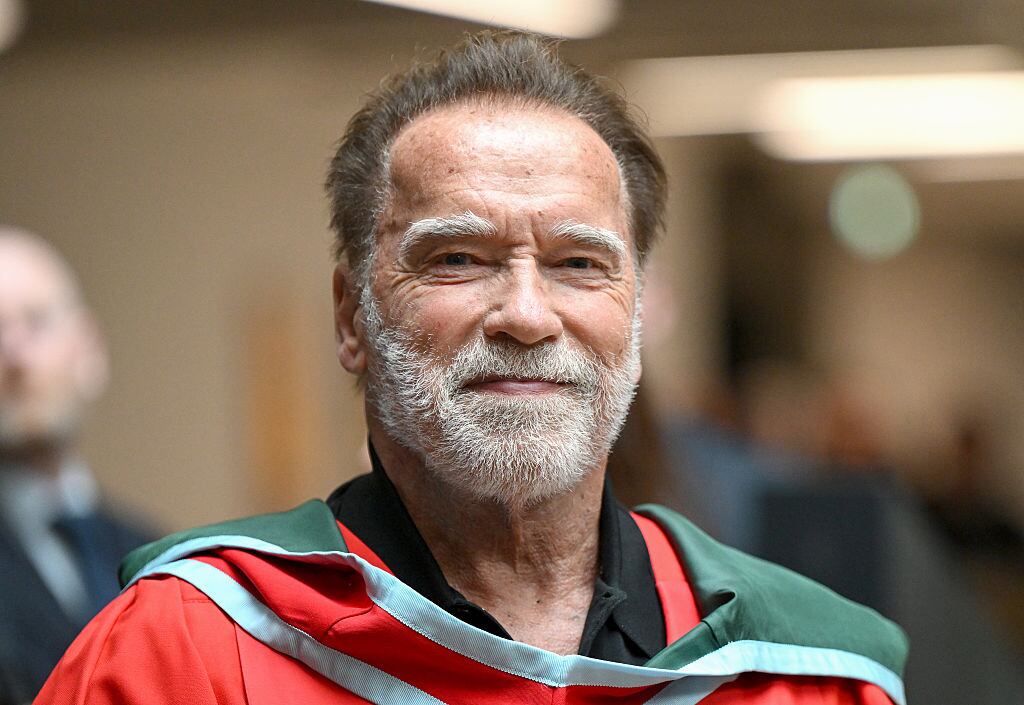 BELFAST, NORTHERN IRELAND - MARCH 30: Arnold Schwarzenegger attends a ceremony to receive a honorary doctorate at Ulster University on March 30, 2026 in Belfast, Northern Ireland. Schwarzenegger was awarded an honorary doctorate in recognition of his outstanding contributions to public service, environmental advocacy, and the arts. An honorary doctorate represents the highest distinction a university can confer, granted to individuals who have made a significant and inspiring impact within their field. (Photo by Charles McQuillan/Getty Images)