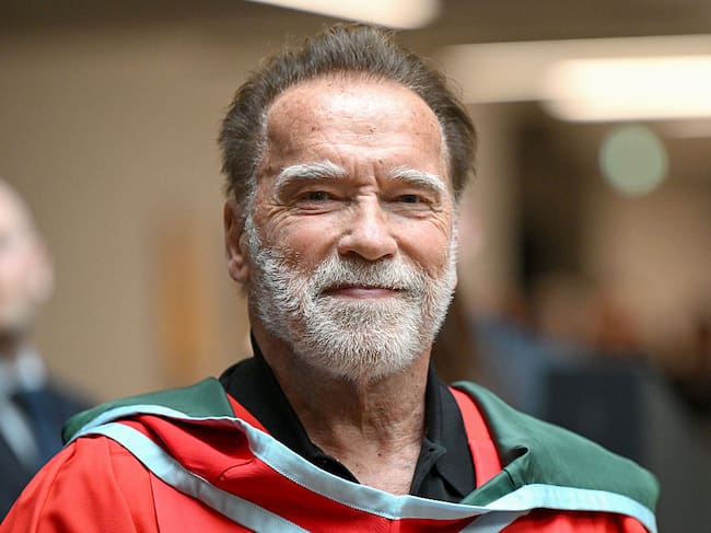 BELFAST, NORTHERN IRELAND - MARCH 30: Arnold Schwarzenegger attends a ceremony to receive a honorary doctorate at Ulster University on March 30, 2026 in Belfast, Northern Ireland. Schwarzenegger was awarded an honorary doctorate in recognition of his outstanding contributions to public service, environmental advocacy, and the arts. An honorary doctorate represents the highest distinction a university can confer, granted to individuals who have made a significant and inspiring impact within their field. (Photo by Charles McQuillan/Getty Images)