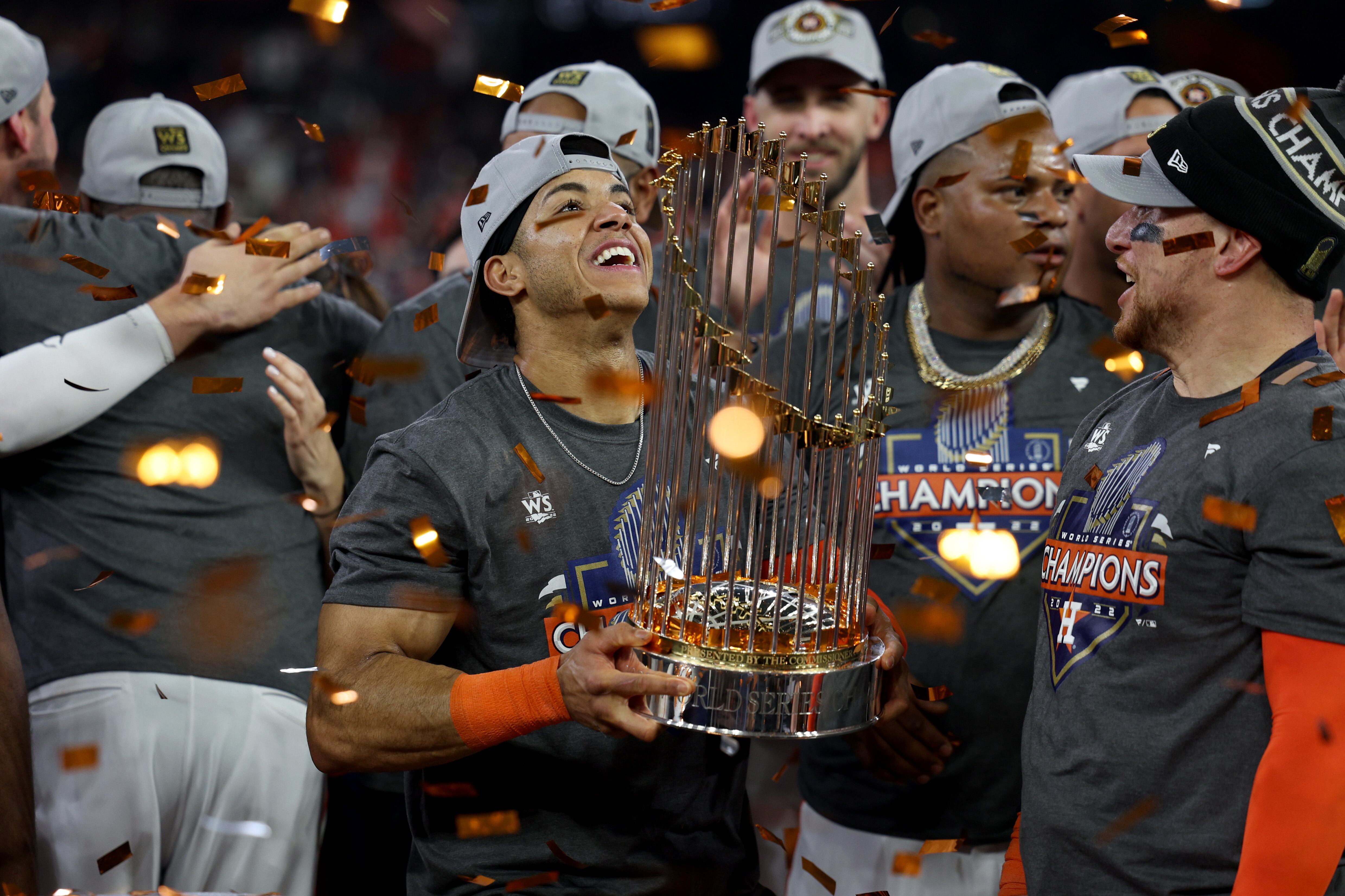 HOUSTON, TEXAS - NOVEMBER 05: Jeremy Pena #3 of the Houston Astros lifts the commissioner's trophy after defeating the Philadelphia Phillies 4-1 to win the 2022 World Series in Game Six of the 2022 World Series at Minute Maid Park on November 05, 2022 in Houston, Texas. (Photo by Harry How/Getty Images)