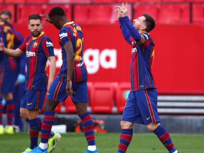 Lionel Messi festeja su gol ante el Sevilla.