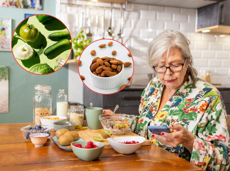 Mujer revisando su celular, mientras desayuna (Getty Images)