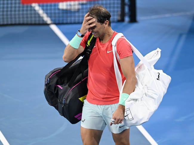 Brisbane (Australia), 31/12/2023.- Rafael Nadal of Spain reacts after losing his doubles match with partner Marc Lopez of Spain against Max Purcell and Jordan Thompson of Australia during their round of 32 doubles match on Day 1 of the 2024 Brisbane International at the Queensland Tennis Centre in Brisbane, Australia, 31 December 2023. (Tenis, Jordania, España) EFE/EPA/DARREN ENGLAND AUSTRALIA AND NEW ZEALAND OUT