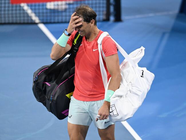 Brisbane (Australia), 31/12/2023.- Rafael Nadal of Spain reacts after losing his doubles match with partner Marc Lopez of Spain against Max Purcell and Jordan Thompson of Australia during their round of 32 doubles match on Day 1 of the 2024 Brisbane International at the Queensland Tennis Centre in Brisbane, Australia, 31 December 2023. (Tenis, Jordania, España) EFE/EPA/DARREN ENGLAND AUSTRALIA AND NEW ZEALAND OUT