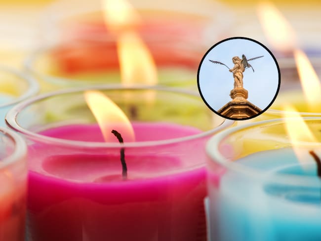 Velas de distintos colores y de fonfo la representación de un arcángel en el entorno religioso. (Fotos vía Getty Images)