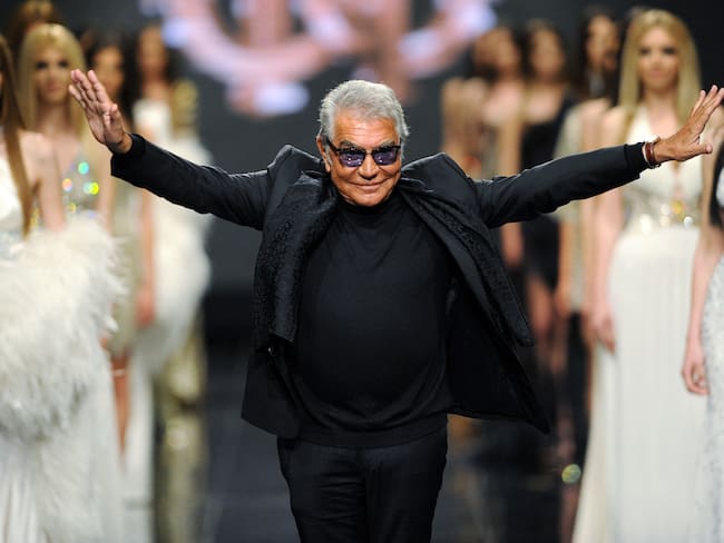 (FILES) Italian fashion designer Roberto Cavalli attends his fashion show on late evening on June 10, 2013, in the Montenegrin coastal town of Budva. - Italian fashion designer Roberto Cavalli has died at 83, Italian medias announced on April 12, 2024. (Photo by SAVO PRELEVIC / AFP)
