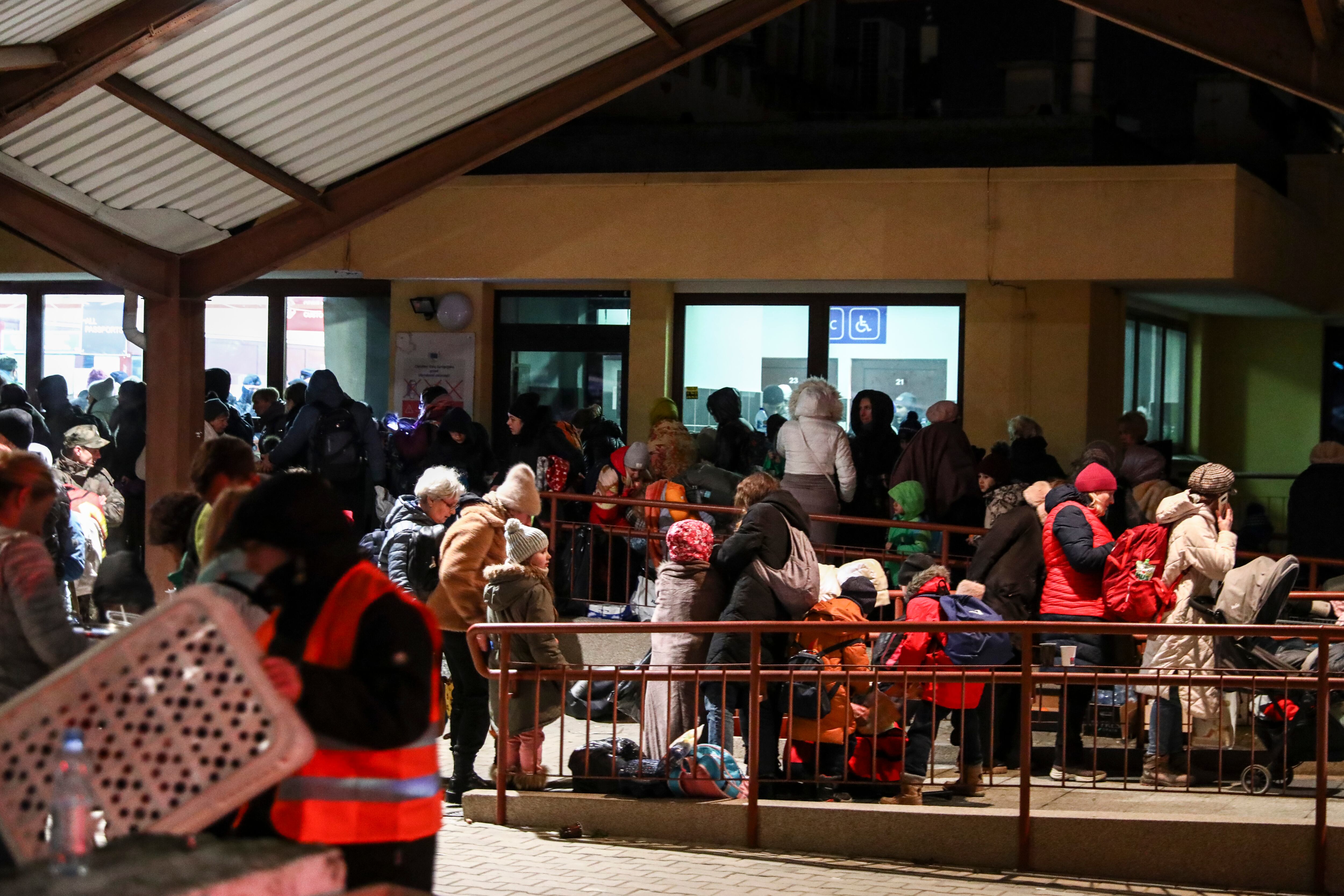 People arrive on a train from Ukraine at the main railway station due to ongoing Russian-Ukrainian war crisis in Przemysl, Poland on February 27, 2022.  Russian invasion on Ukraine causesa mass exodus of refugees to Poland.   (Photo by Beata Zawrzel/NurPhoto via Getty Images)