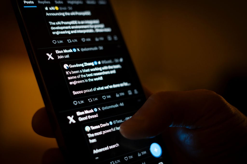 The X app, formerly known as Twitter is seen on an iPhone in this photo illustration taken on 10 November, 2023 in Warsaw, Poland. (Photo by Jaap Arriens/NurPhoto via Getty Images)